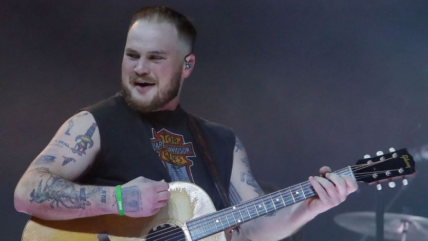 Zach Bryan Will Re-Release John Moreland Collab Amid Online Feud: “Not Partial To Arguing With Butt Hurt Grown Men”