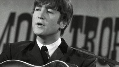 John Lennon performing