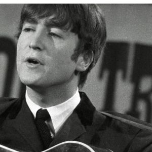 John Lennon performing