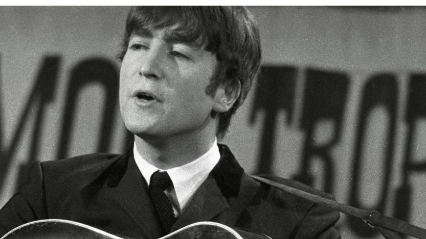 John Lennon performing