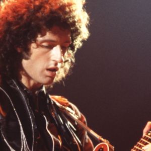 Brian May from Queen performing