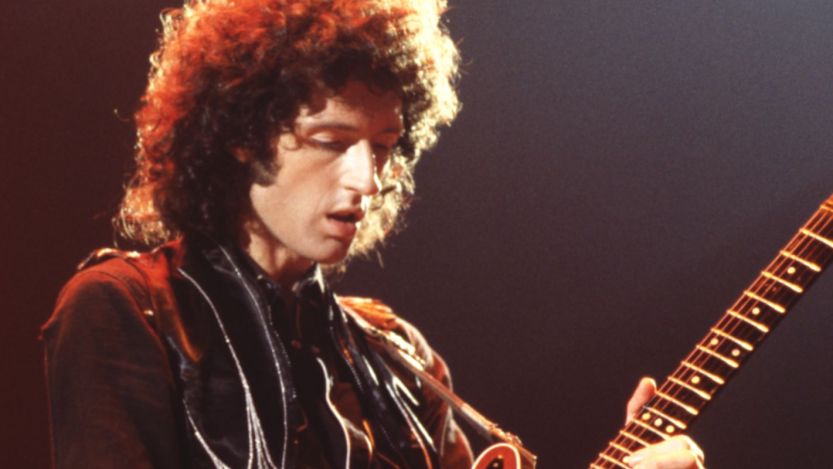 Brian May from Queen performing