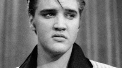 Elvis Presley in 1956, year he scored first No. 1 single