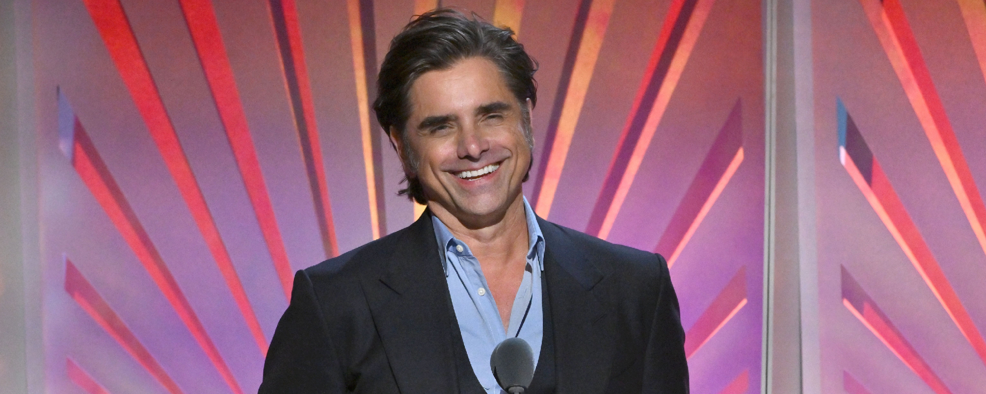 John Stamos Fights Back Tears, Reveals He Broke the News of Brian Wilson's Death to Mike Love - American Songwriter