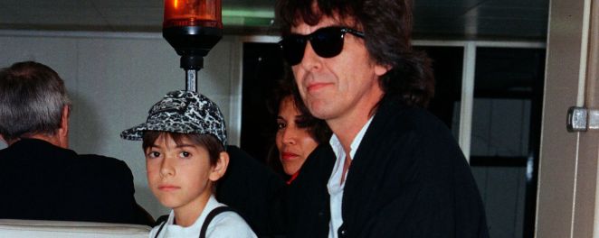 George Harrison's son sitting next to the former Beatle