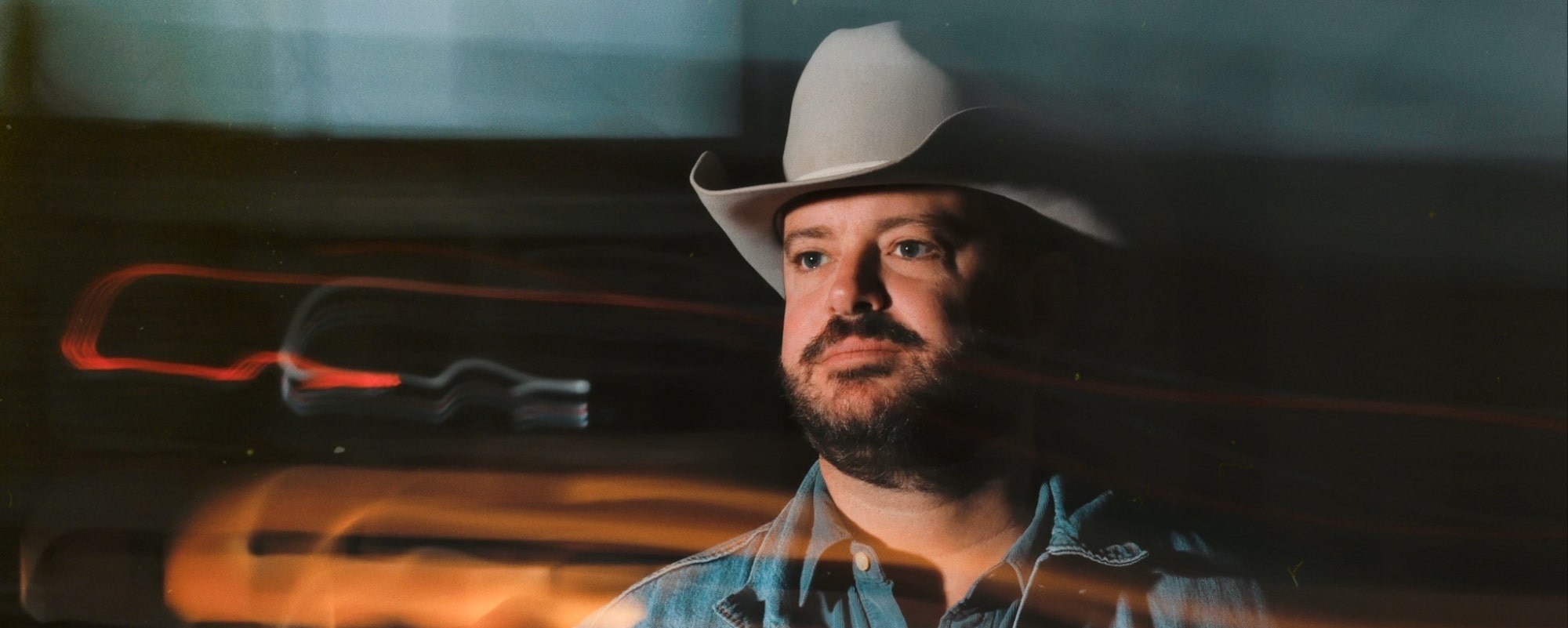 Wade Bowen Teams Up with Cody Johnson for a Heartfelt Stripped-Down Version of “Hidin Behind This Microphone” (Exclusive Premiere)