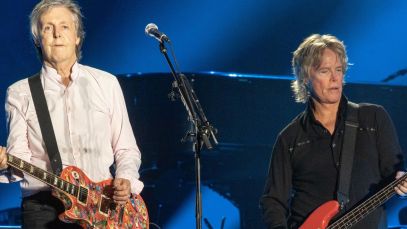Paul McCartney and Brian Ray performing together