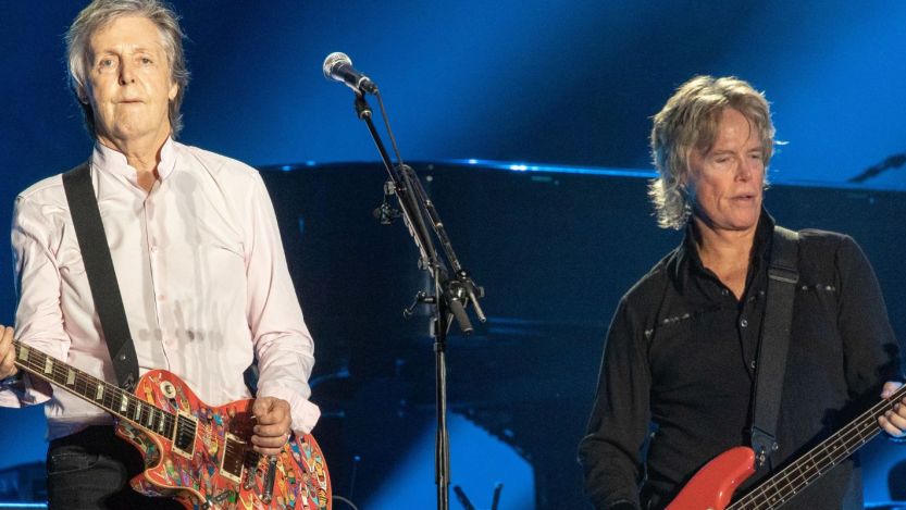 Paul McCartney and Brian Ray performing together