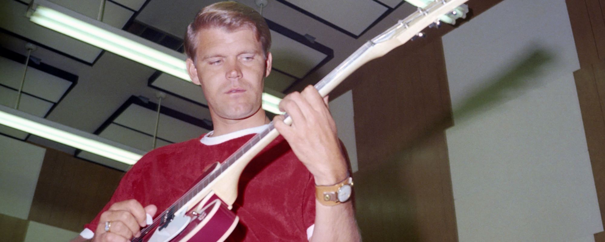 Glen Campbell playing guitar