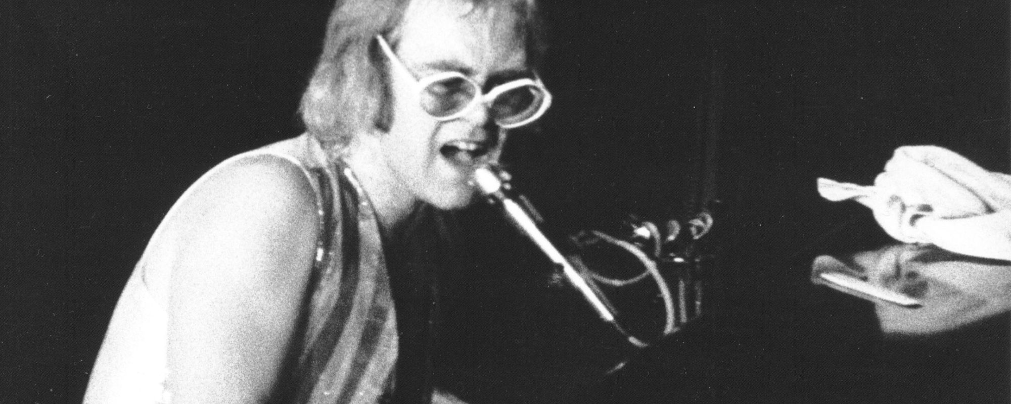 Elton John’s “Bennie and the Jets” Features This Late Rock Icon’s Live Concert Footage