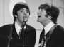Paul McCartney and John Lennon performing