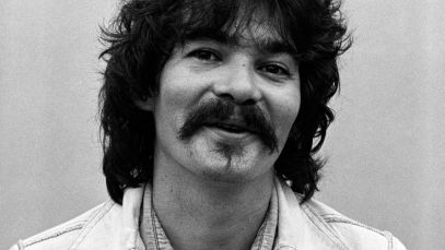 John Prine smiling