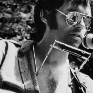 Neil Young performing on outdoor property