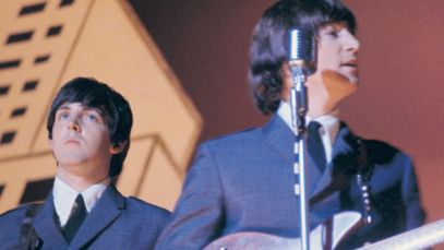 John Lennon and Paul McCartney performing