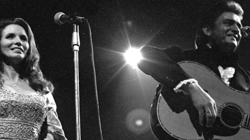June Carter and Johnny Cash performing