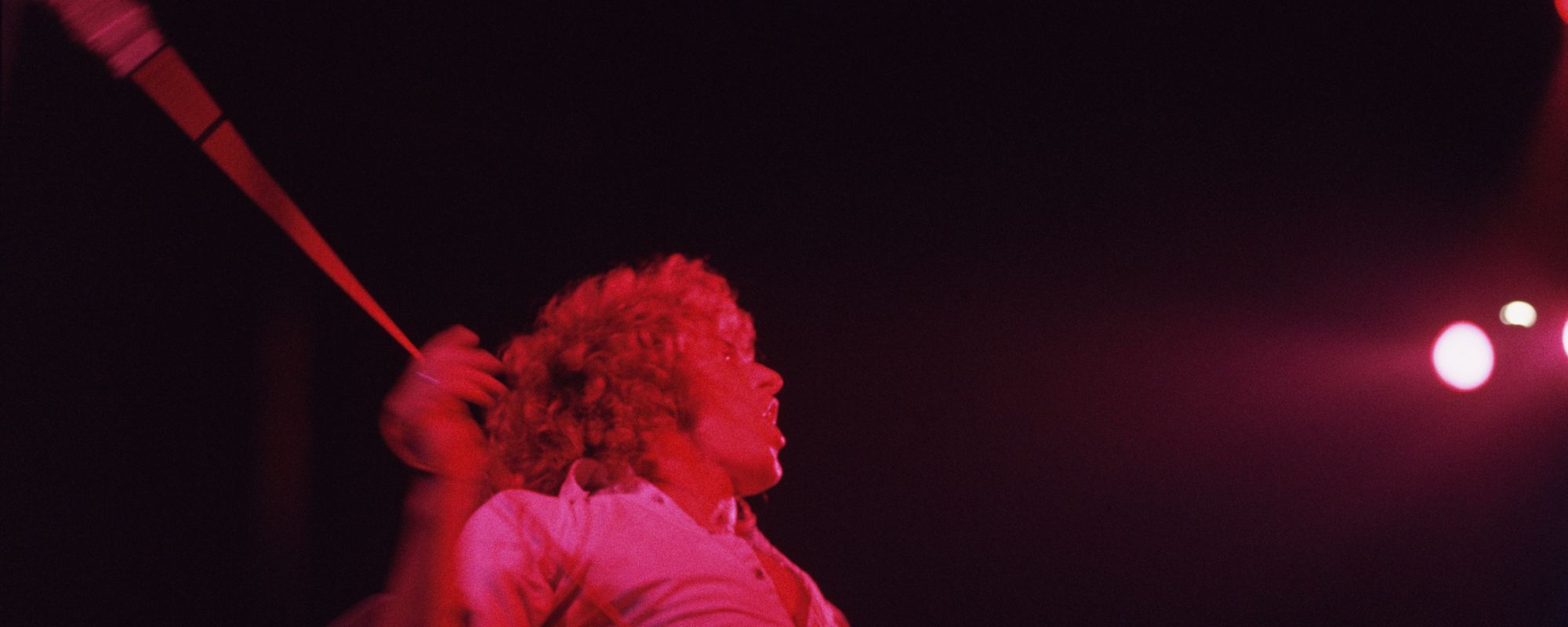 Roger Daltrey swinging mic