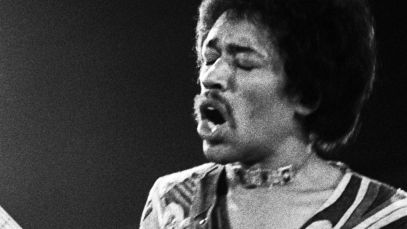 Jimi Hendrix performing