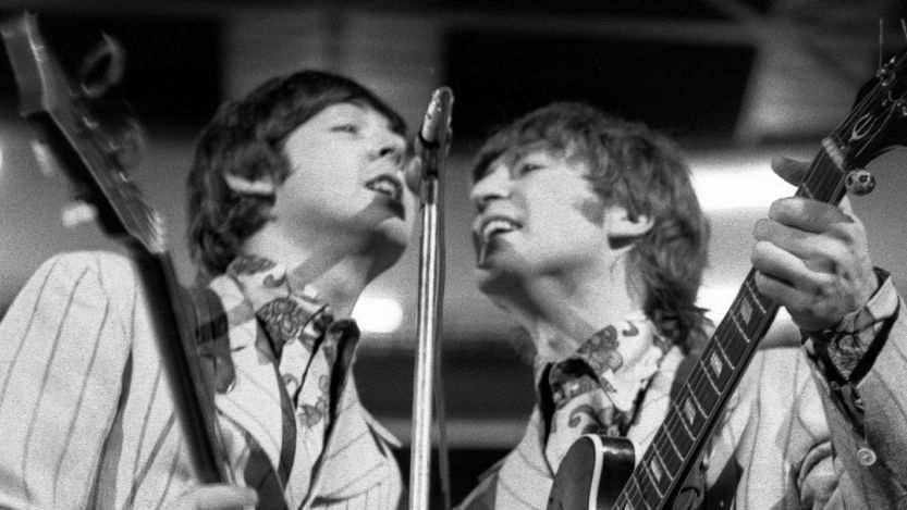 Paul McCartney and John Lennon performing