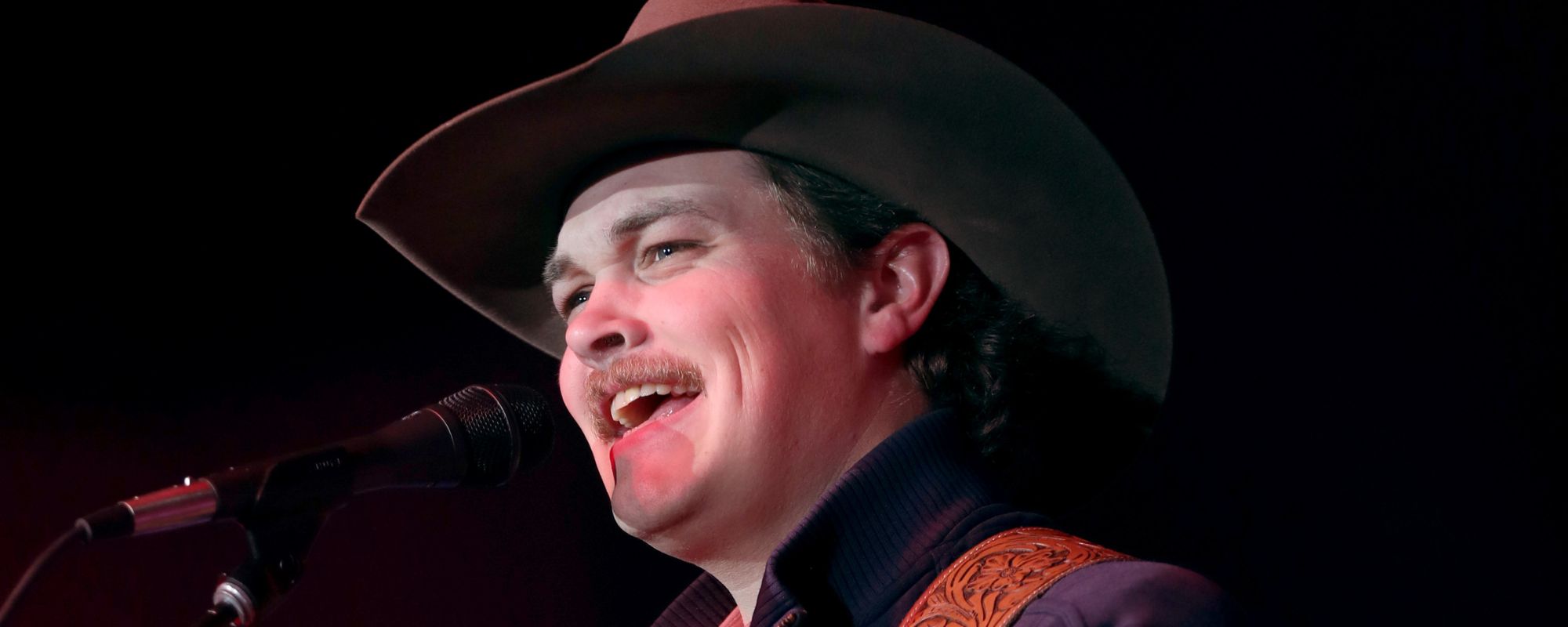 Zach Top Jokes He Feels Like “A Male Stripper” After Brief Stint in Citadel Hat During Charleston Show