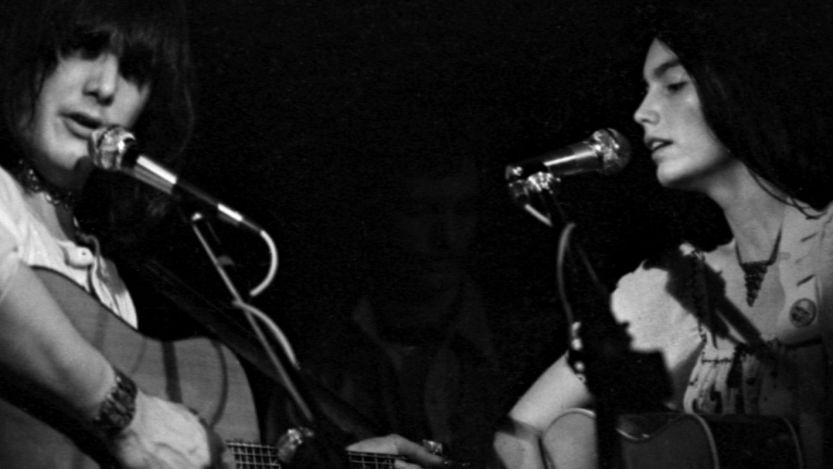 Gram Parsons and Emmylou Harris performing