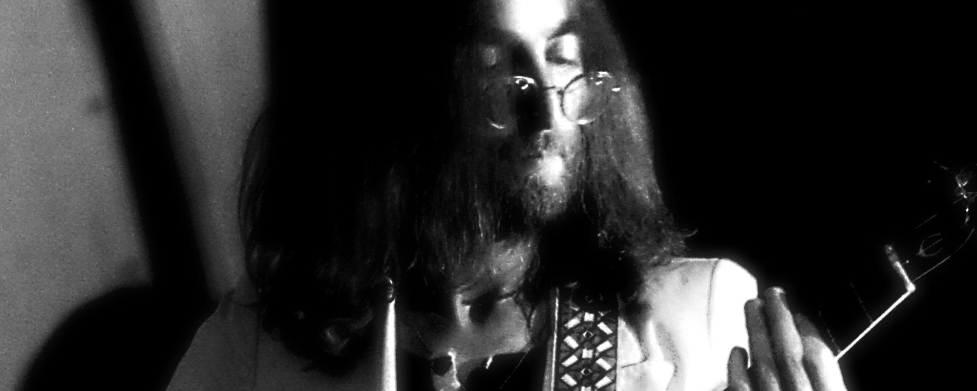 John Lennon performing