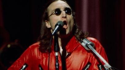 John Lennon performing