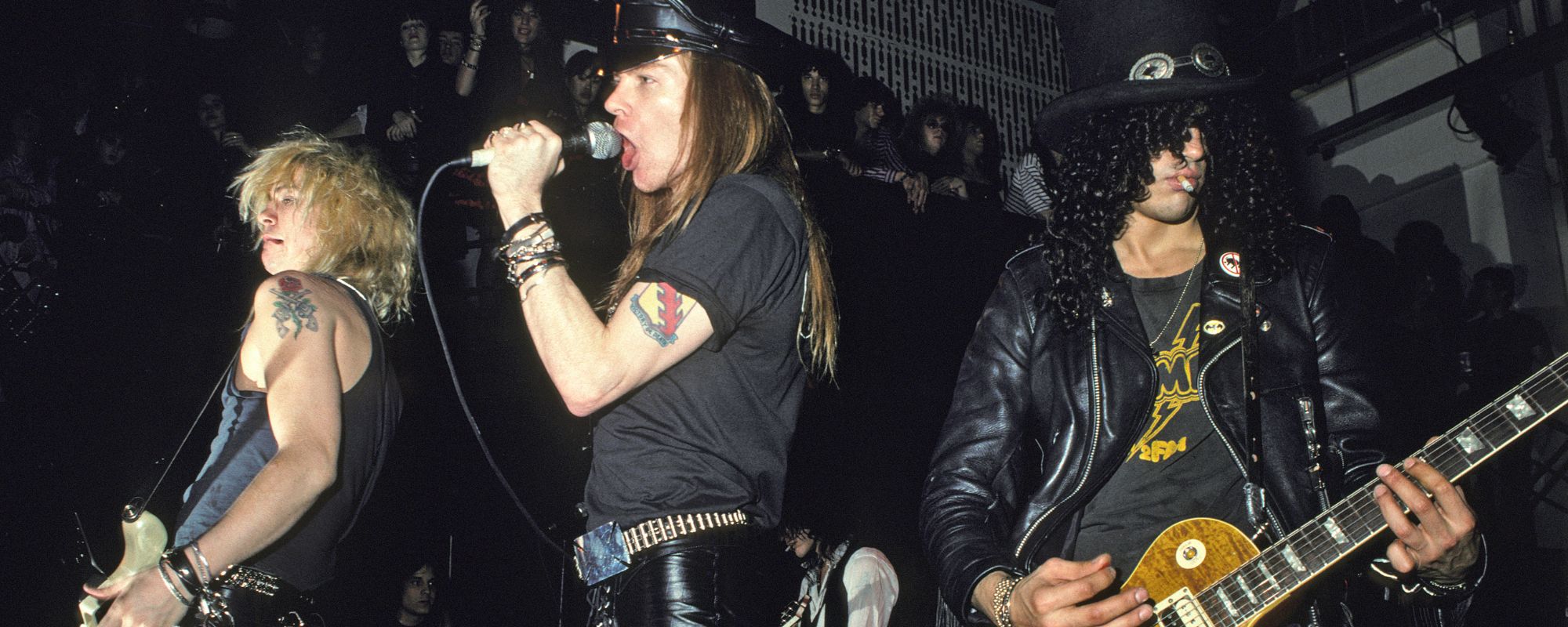 Guns N' Roses playing, Slash on far right
