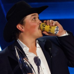 Zach Top Accidentally Brings Beer Onstage to Accept CMA New Artist Award