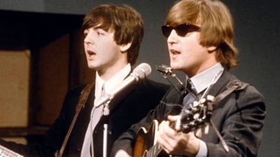 Paul McCartney and John Lennon of The Beatles performing