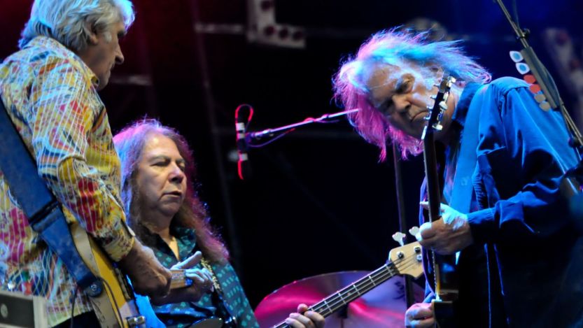 Neil Young peforming with Rick Rosas