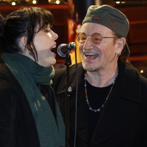 Watch U2’s Bono Sing Rocking Classic Holiday Tune with Imelda May at Annual Christmas Eve Charity Busking Event in Dublin