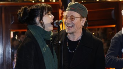 Watch U2’s Bono Sing Rocking Classic Holiday Tune with Imelda May at Annual Christmas Eve Charity Busking Event in Dublin