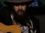 Blaze Foley playing guitar