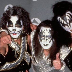 Members of KISS posing in makeup
