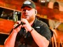Luke Combs Fuels Fan Buzz With New "Sleepless in a Hotel Room" Tease Before Upcoming Announcement