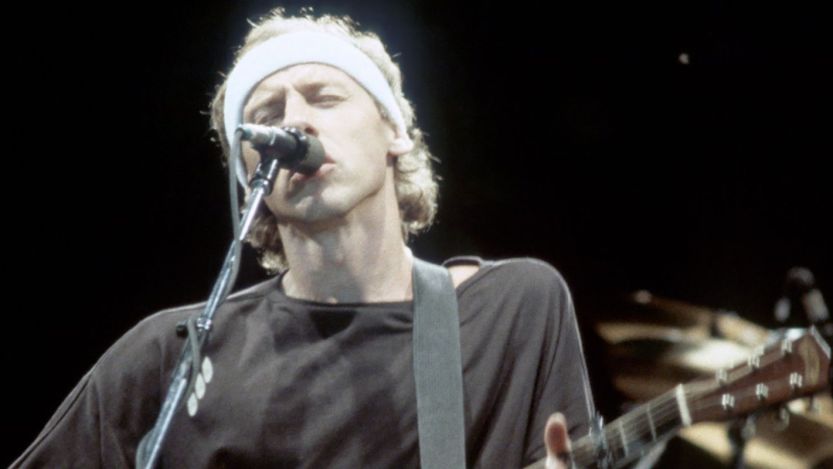 Mark Knopfler performing