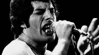 Queen vocalist Freddie Mercury performing