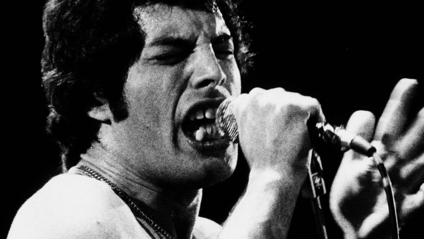 Queen vocalist Freddie Mercury performing