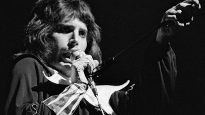 Freddie Mercury performing