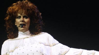 3 Hit Country Songs From the 90s With Outdated Lyrics (But We Can’t Stop Listening to Them)