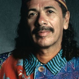 Carlos Santana wearing Jimi Hendrix shirt