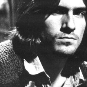 James Taylor playing guitar