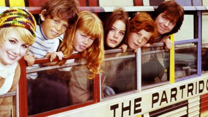 Shirley Jones, US actress and singer, Brian Forster, US actor, Suzanne Crough, US actress, Susan Dey, US actress, Danny Bonaduce, US actor, and David Cassidy, US actor and singer, pose leaning out of the windows of a bus in a group portrait issued as publicity for the US television series, 'The Partridge Family', USA, circa 1973. The sitcom starred Jones as 'Shirley Renfrew Partridge', Forster as 'Chris Partridge', Crough as 'Tracy Partridge', Dey as 'Laurie Partridge', Bonaduce as 'Danny Partridge', and Cassidy as 'Keith Douglas Partridge'. (Photo by Silver Screen Collection/Getty Images)