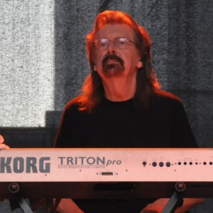 PURKERSDORF, AUSTRIA - JUNE 16: Louis Clark of ELO performs on stage during the Adi Hirschall And ELO Concert at Hauptplatz Purkerdorf on June 16, 2012 in Purkersdorf, Austria. (Photo by Manfred Schmid/Getty Images)