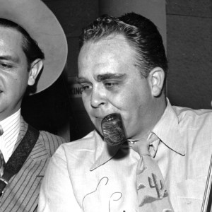 Musician Merle Travis performs with bassist and songwriter and A&R man Cliffie Stone on the radio at Capitol Records circa 1947 in Los Angeles. (Photo by Michael Ochs Archives/Getty Images)