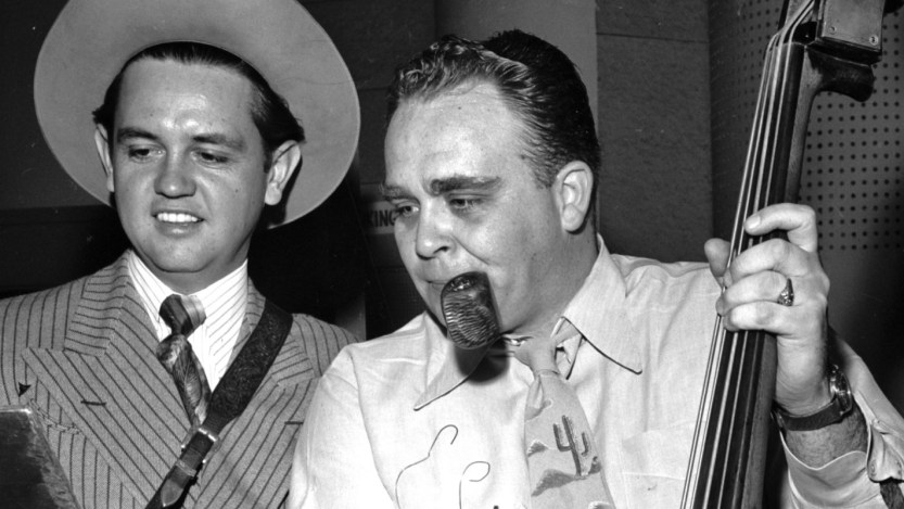Musician Merle Travis performs with bassist and songwriter and A&R man Cliffie Stone on the radio at Capitol Records circa 1947 in Los Angeles. (Photo by Michael Ochs Archives/Getty Images)