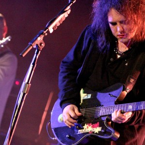INDIO, CA - APRIL 19: Musicians Porl Thompson (L) and Robert Smith of the band The Cure perform during day three of the Coachella Valley Music & Arts Festival 2009 held at the Empire Polo Club on April 19, 2009 in Indio, California. (Photo by Trixie Textor/Getty Images)