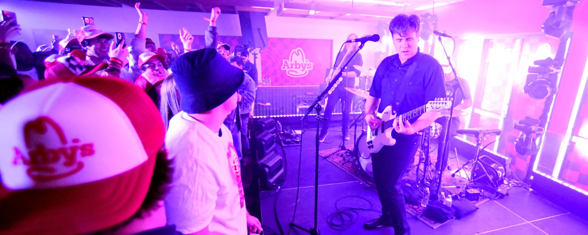 “Sir This Is Literally an Arby’s”: Early 2000s Pop-Punk Legends Surprise Fast-Food Crowd With Live Performance