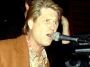 Brian Wilson playing the piano and singing
