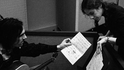 James Taylor and Carole King working in the studio
